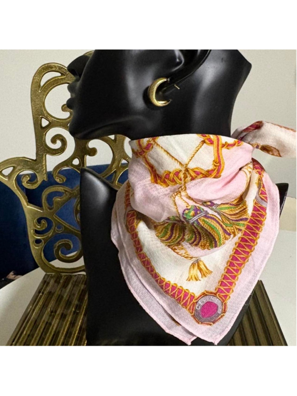 Pink Celine scarf with gold and pink ornate design featuring a central medallion